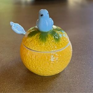 Sugar bowl with spoon and little bird on top